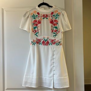 NWOT embroidered mini from ASOS. Size 6. Really pretty.